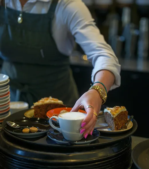 A server greeting guests