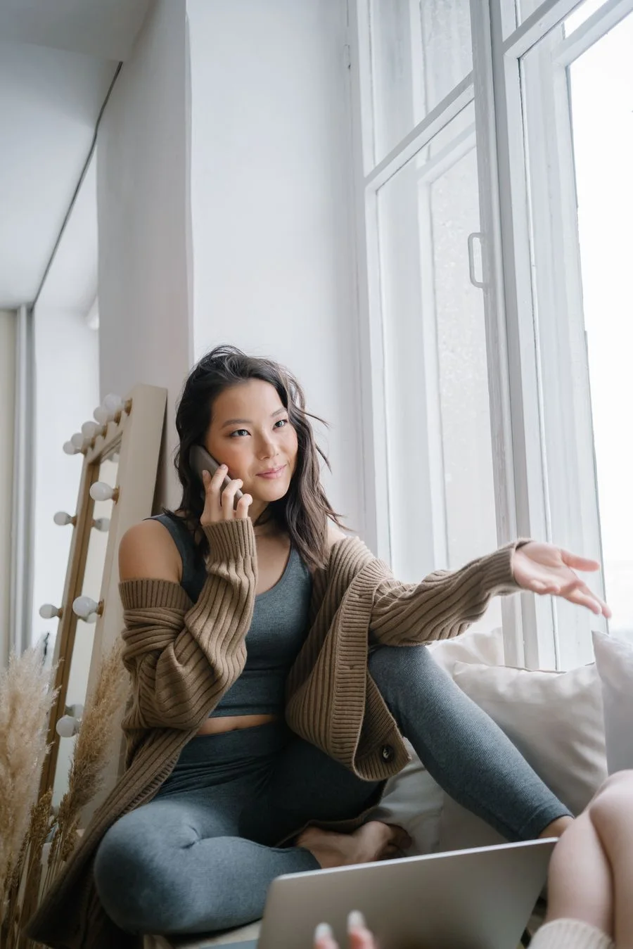 A customer taking a call at home about their order